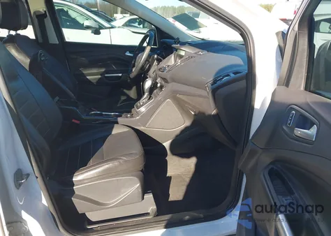 2014 Ford Escape Titanium z USA, uszkodzony, nr VIN 1FMCU9J92EUA51045